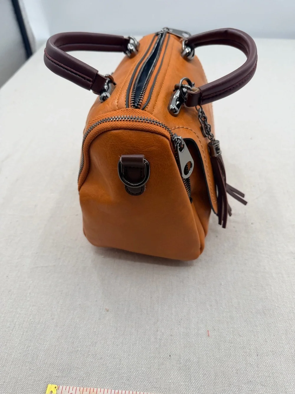 Structured Orange Satchel with Tassel Accent
